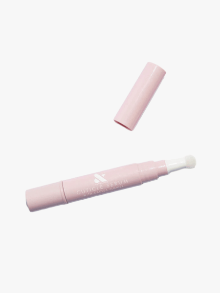 Olive & June Cuticle Serum in branded component on a light gray background