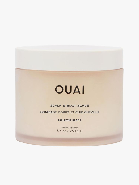 Ouai Scalp & Body Scrub beige jar with white lid on light gray background