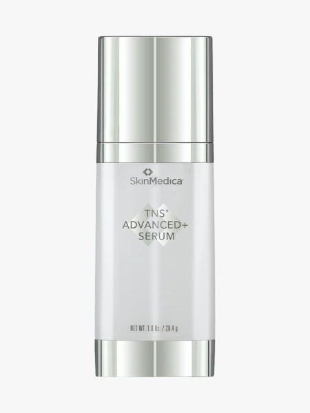 SkinMedica TNS+ Advanced Serum silver bottle on light gray background